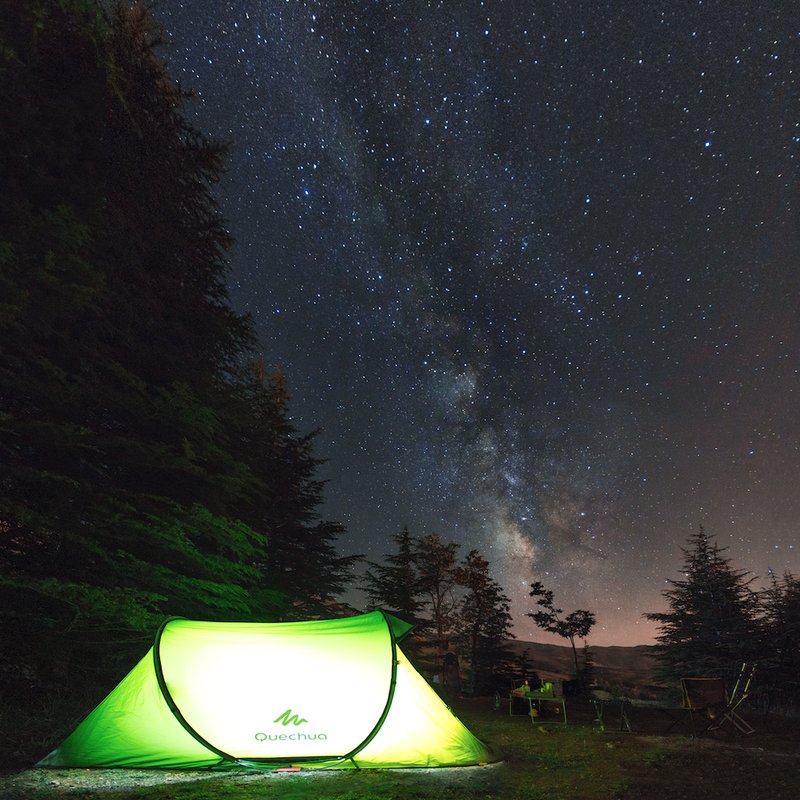 Camping tent under the Milky Way at night